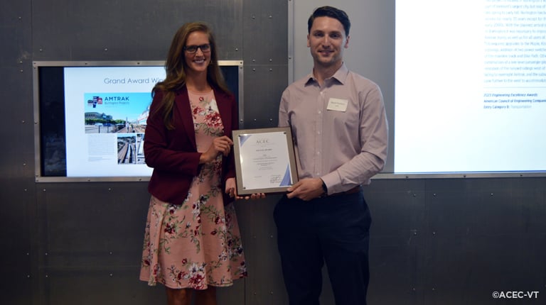 Ryan Forbes accepts the Grand Award and the Green Mountain Award from Erin Sisson, Vermont Agency of Transportation’s (VTrans) Deputy Chief Engineer.