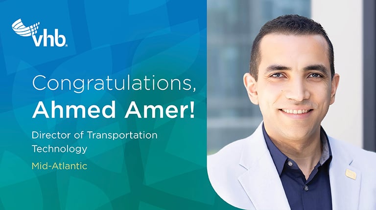 Ahmed Amer smiles at the camera. 