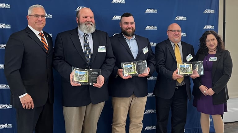 Frank Koczalka and the project team accept the Project of the Year Award at the New England APWA Ceremony. 