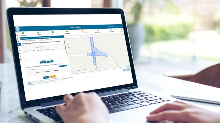 Laptop screen displaying a dashboard from the safety management system.