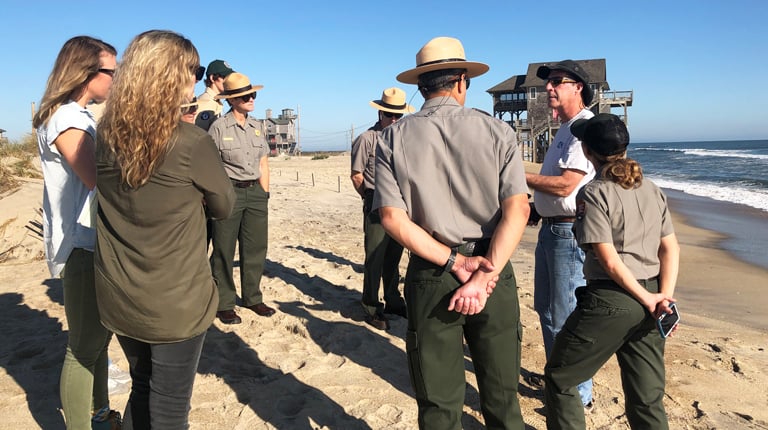 Photo 01: Consultants gather with National Park Service Rangers at Cape Hatteras National Seashore.