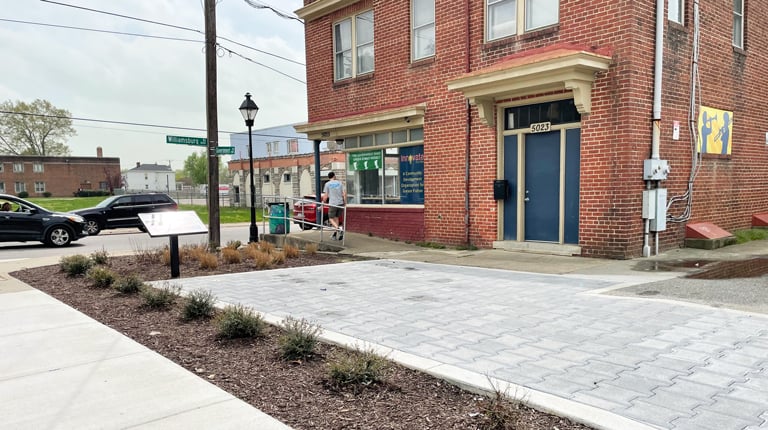 New permeable pavers and plantings.
