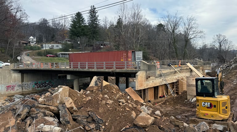 Repair efforts underway at a bridge impacted by Hurricane Helene. 