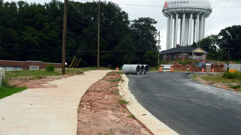 The improvements encourage active transportation, providing better pedestrian access to locations like schools, libraries, businesses, and childcare centers. 