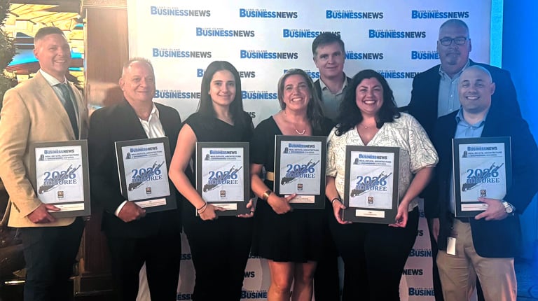 VHB team members accept awards at the LIBN Awards ceremony.