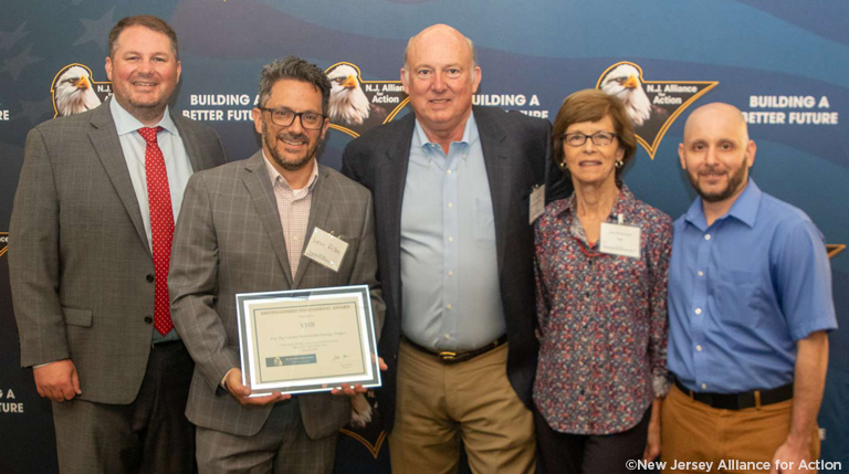 Project partners accept Distinguished Engineering Award for Linden Renewable Energy.