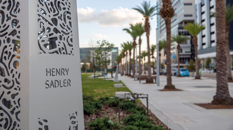 A Luminary Green Park Memorial with a patterned façade and the name Henry Sadler