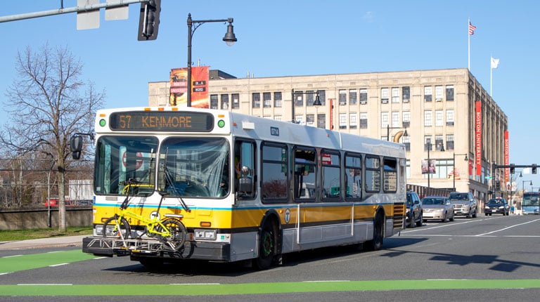 MBTA bus at a stop near Boston University.