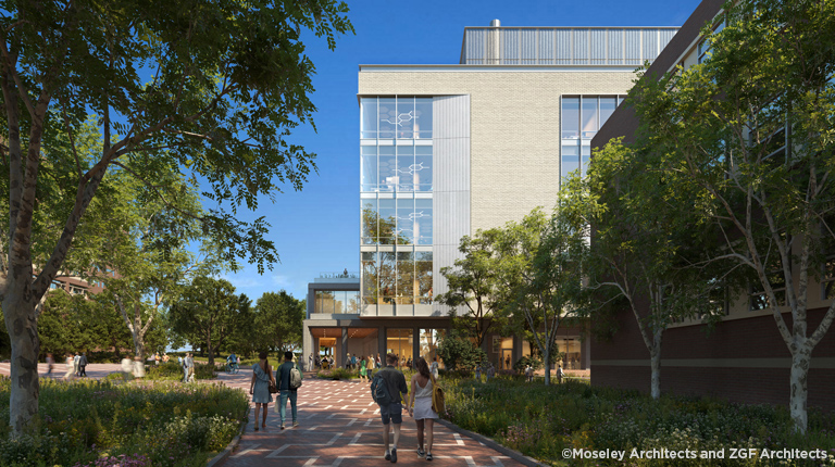 An exterior view of the new building surrounded by students moving through campus.