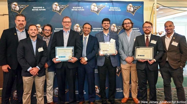 VHB team members accepting three Distinguished Engineering Awards at the New Jersey Alliance for Action awards ceremony. 