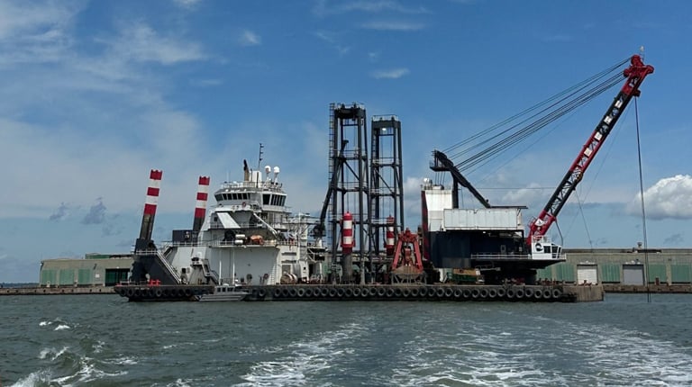 The crane and specialized dredging equipment to help deepen and clear channels. 