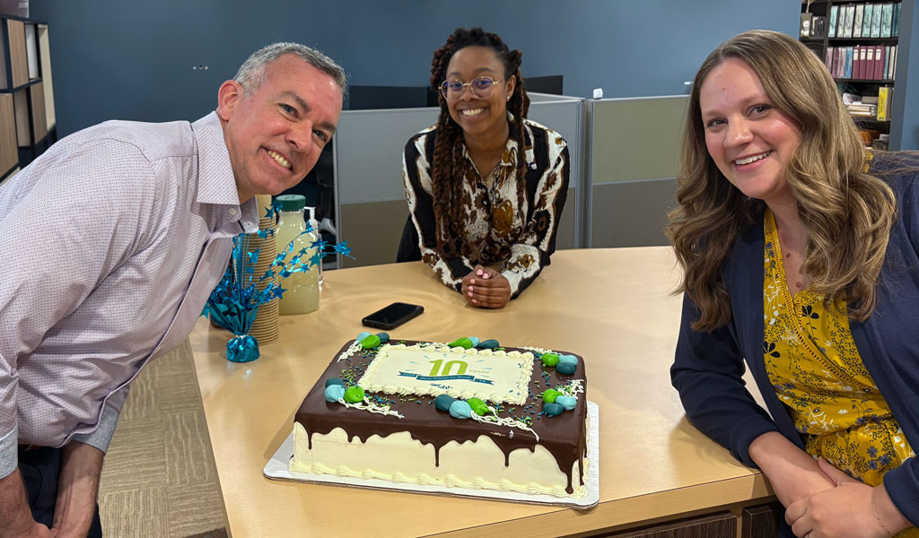 VHB celebrates 10 years as a Best Place to Work in Virginia with cake! 