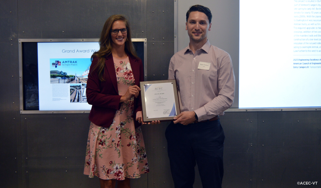 Ryan Forbes accepts the Grand Award and the Green Mountain Award from Erin Sisson, Vermont Agency of Transportation’s (VTrans) Deputy Chief Engineer.
