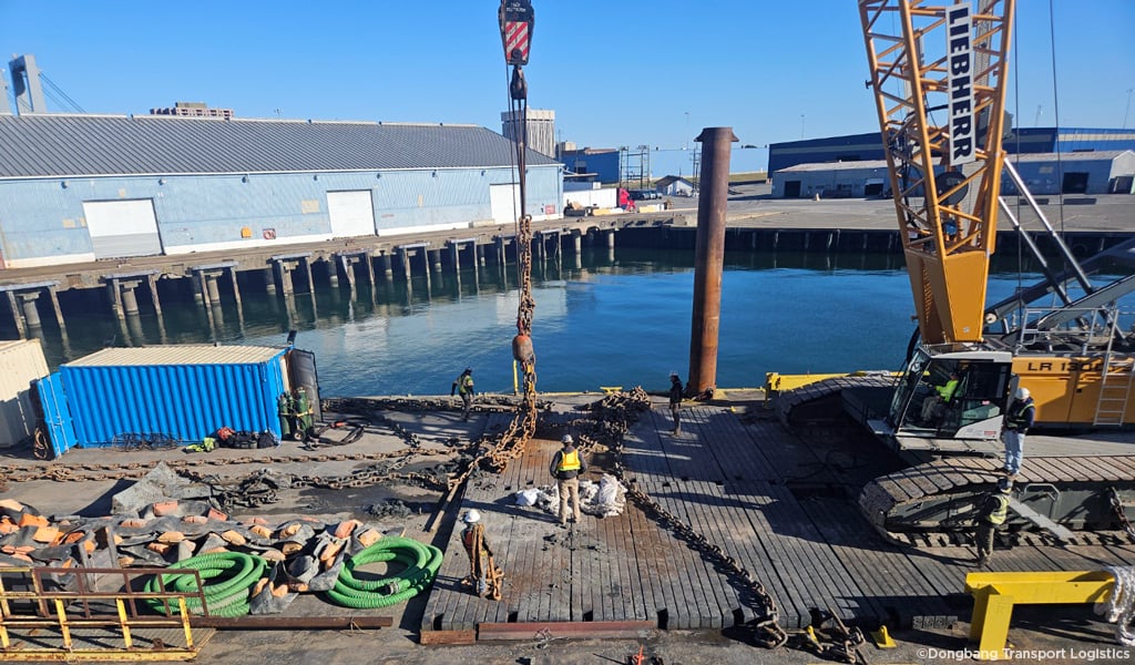 Missing anchor and chain resting on the ship after being pulled out of the channel.
