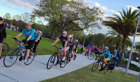 A group of bicyclists preparing to bike to work in Orlando