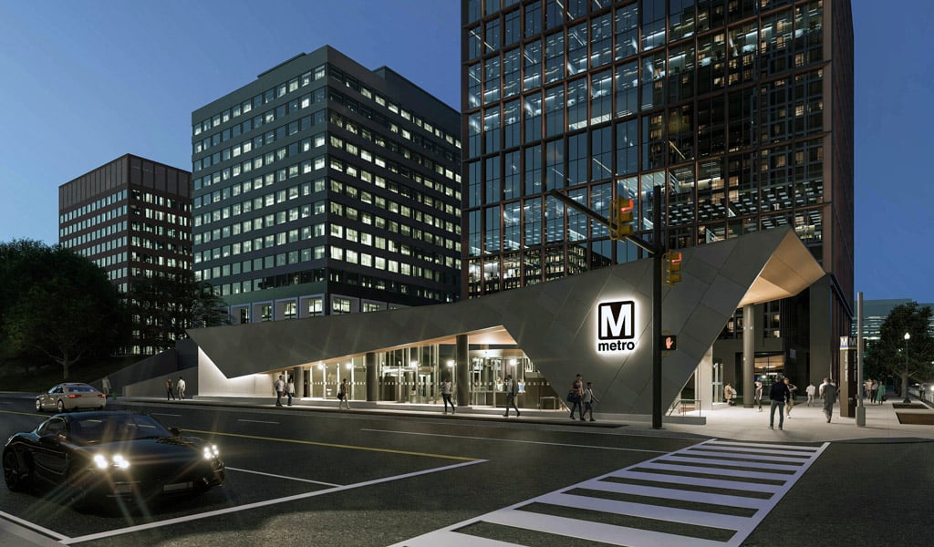 Rendering of the Crystal City Metro Station East Entrance, featuring a modern glass-and-steel entrance and surrounding streetscape.