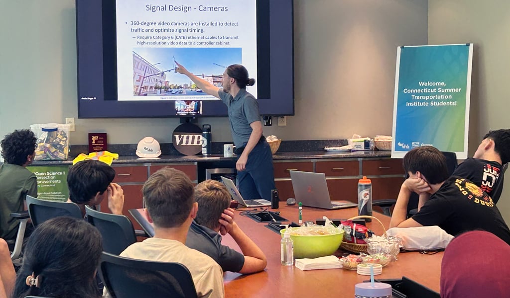 Andre Singer presents on traffic analysis and signal design during the CSTI Wethersfield office tour. 