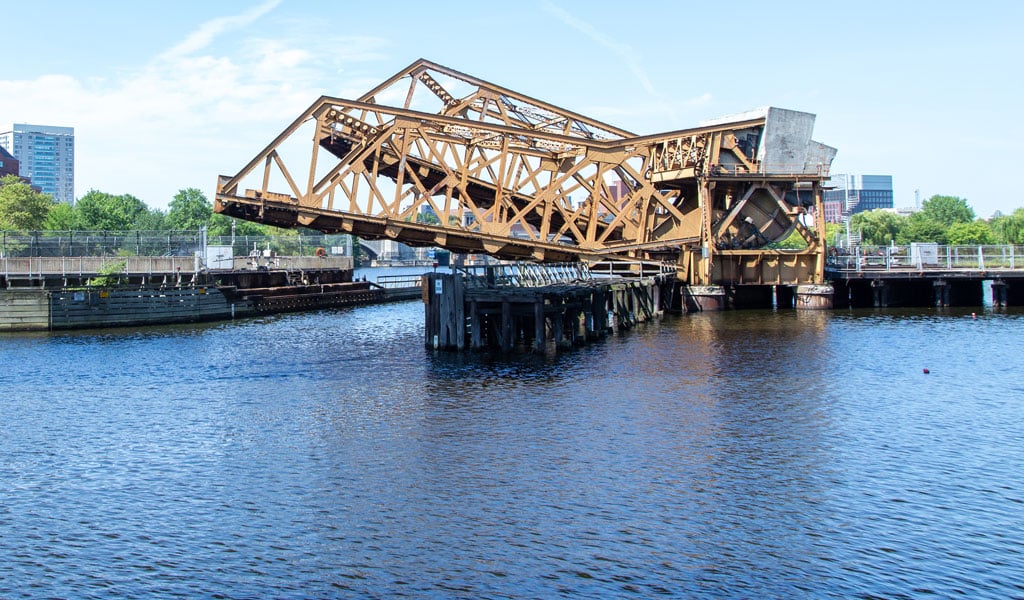 A draw bridge with both tracks beginning to raise
