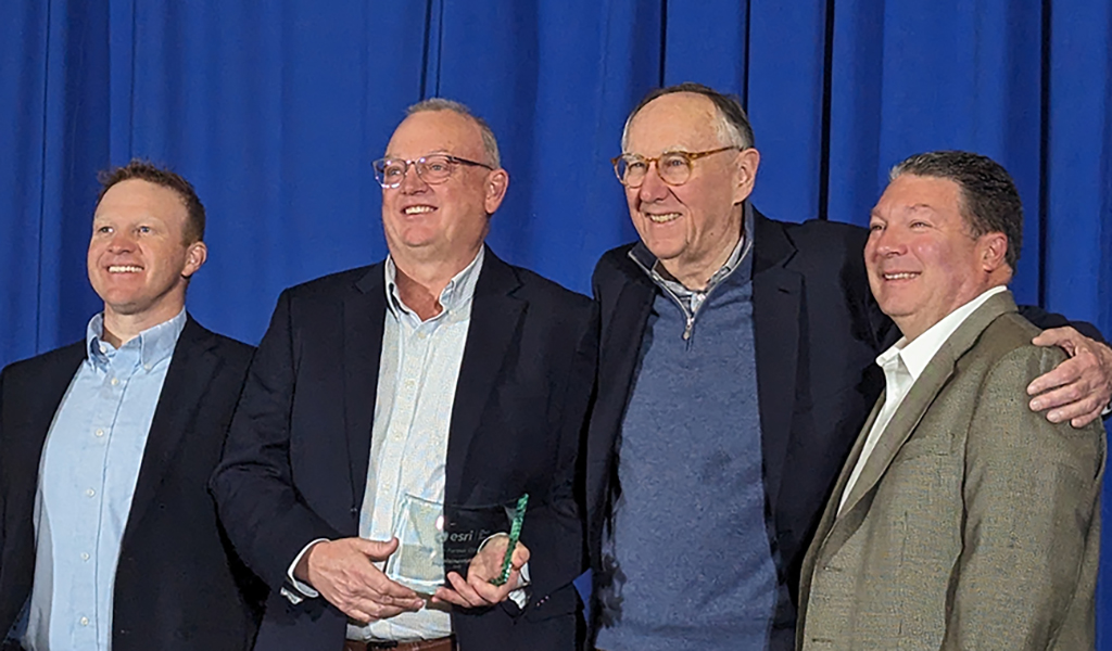 VHB’s Steve Anderson, Dale Abbott, and Larry Spraker accepts Esri award at the 2024 Esri Partner Conference on March 10, 2024.