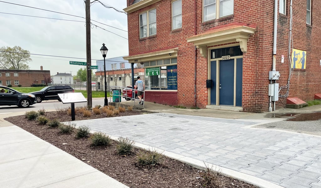 New permeable pavers and plantings.