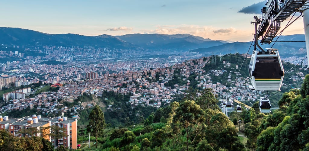 A cable car descending over the Colombian city of Medellin.