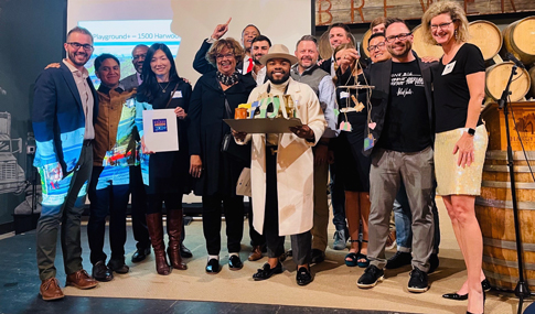 The design team poses for a photo with the award.