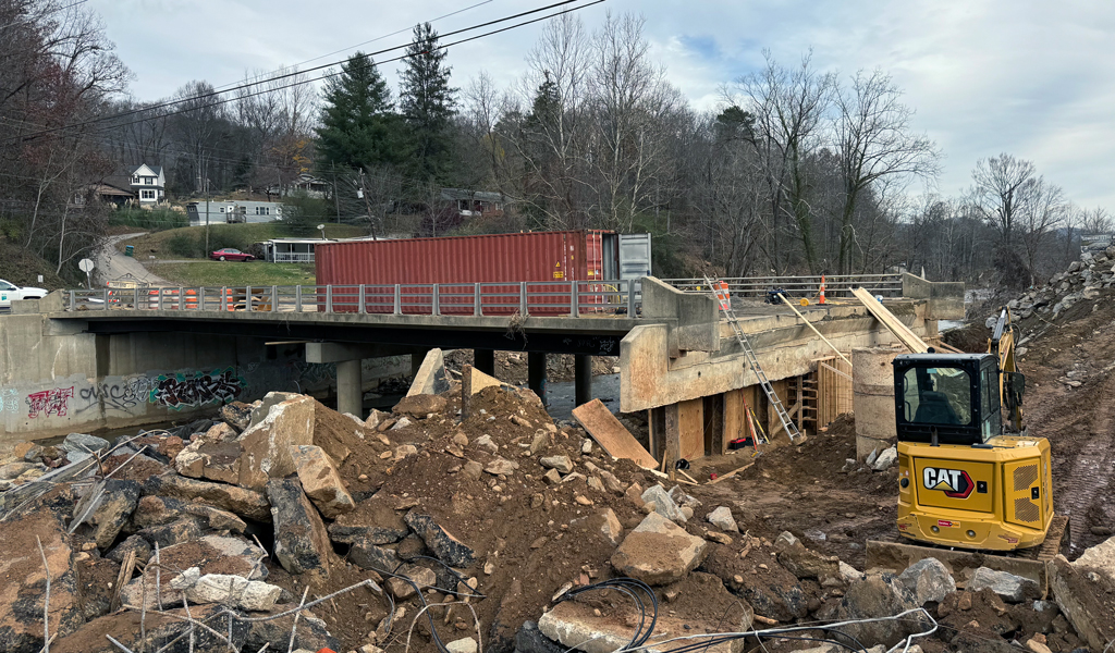 Repair efforts underway at a bridge impacted by Hurricane Helene. 