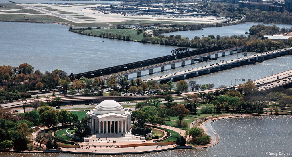 Aerial photo of Washington, DC, with the Jefferson Memorial in the foreground and Long Bridge in the background.