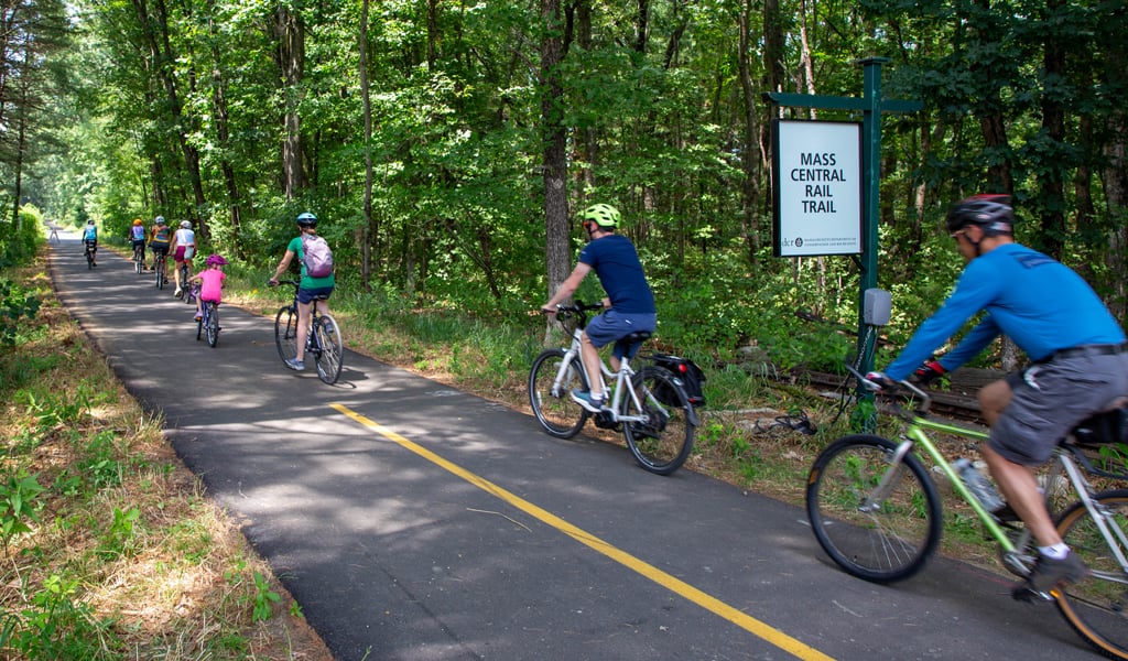 People walk and bike along the newly opened Sudbury-Hudson rail trail in MetroWest Massachusetts.