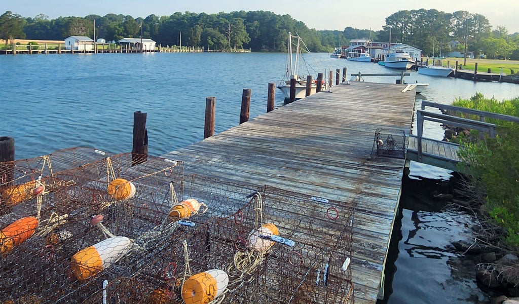 Seafood traps sit on the dock.