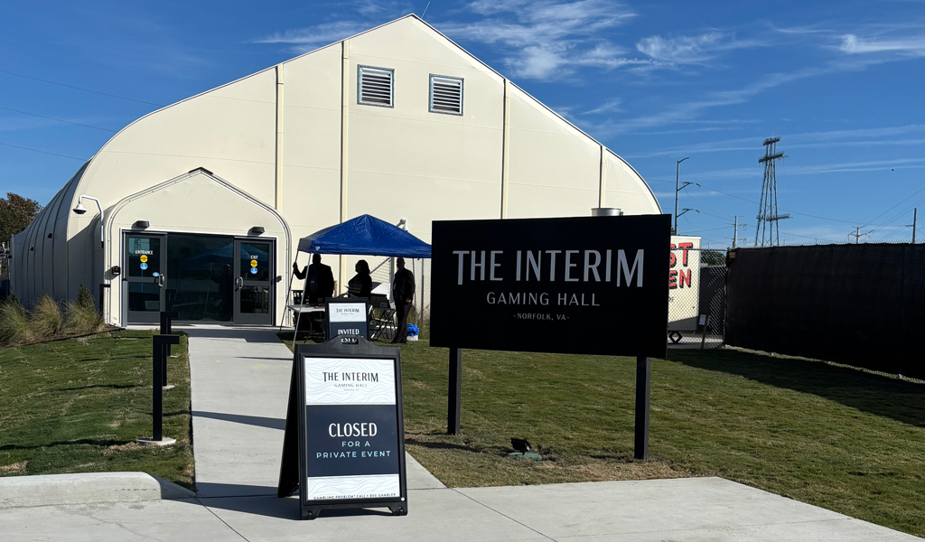 An exterior image of a temporary gaming hall, a white tent-like structure, in Norfolk. 