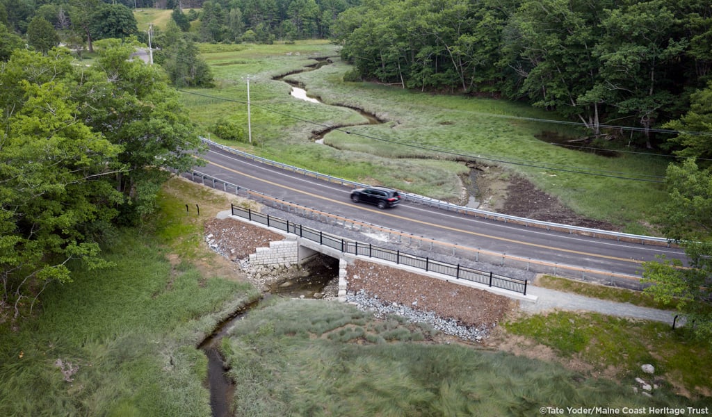 Aerial view of Mill Creek Crossing with stream in distance.