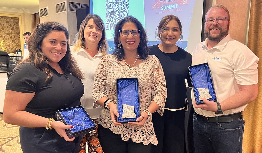 The VHB reTHINK Your Commute team members pose with their awards
