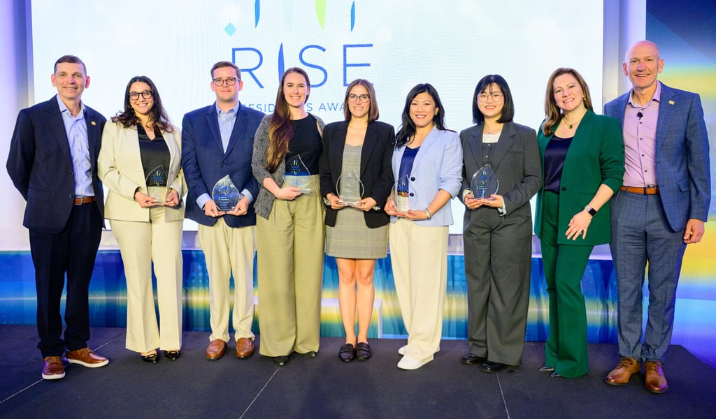From left to right: Chief Operating Officer Tom Jackmin, Sara Yasin, Connor Burke, Marisa Blackwood, Madi Karis, Susan Lee, Hyeajin Kim, Chief People Officer Keri Kocur, and President Bill Ashworth.