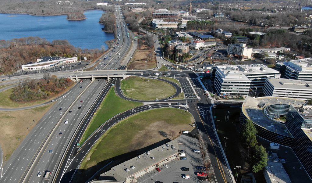 Aerial view of 128/I-95 Route 20 rotary, looking northeast with a report cover thumbnail image in lower right corner