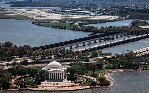 Aerial view of the Jefferson Memorial, adjacent roads, and surrounding waterways in Washington, D.C.