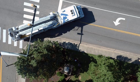 Aerial view captures the turn radius of a fire truck. 