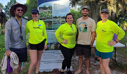 VHB Green Team members donate time to maintain a Florida shoreline