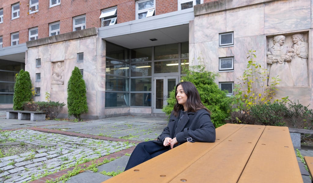 Lindsey Cassone in the courtyard of the CUNY Hunter College Brookdale campus.