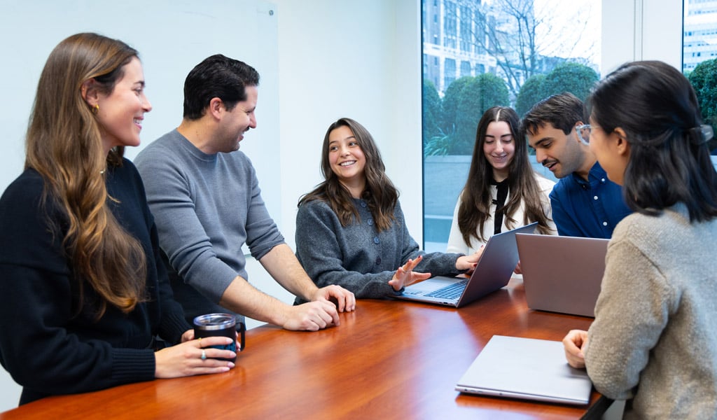 VHB's environmental team meeting in a conference room.