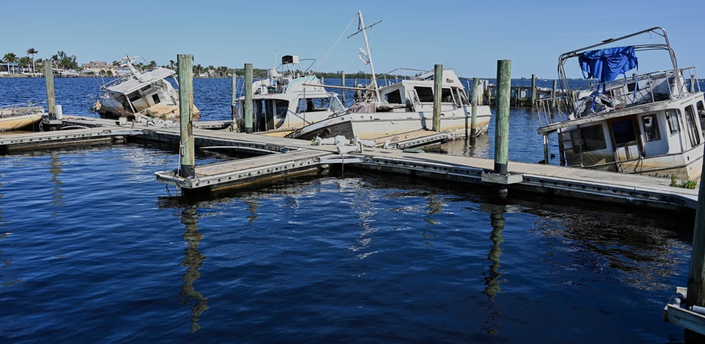 Tampa’s Tropicana Field partially destroyed roofline.