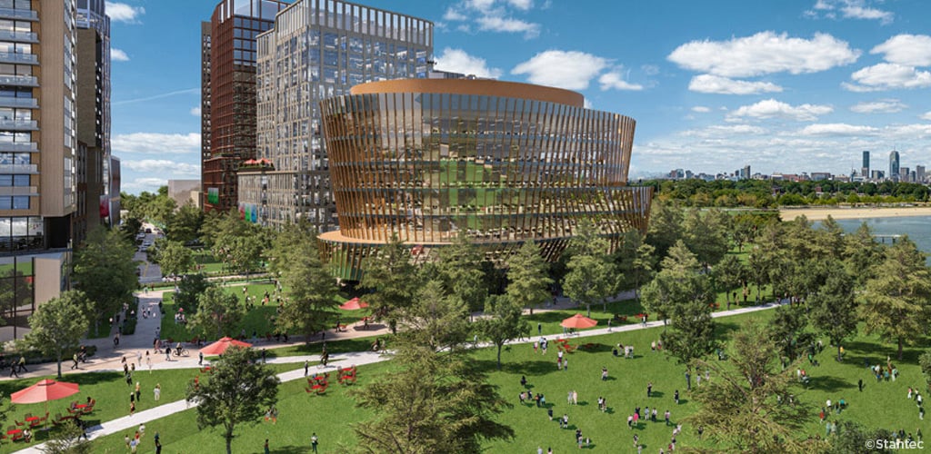 New buildings and walking paths along a harbor