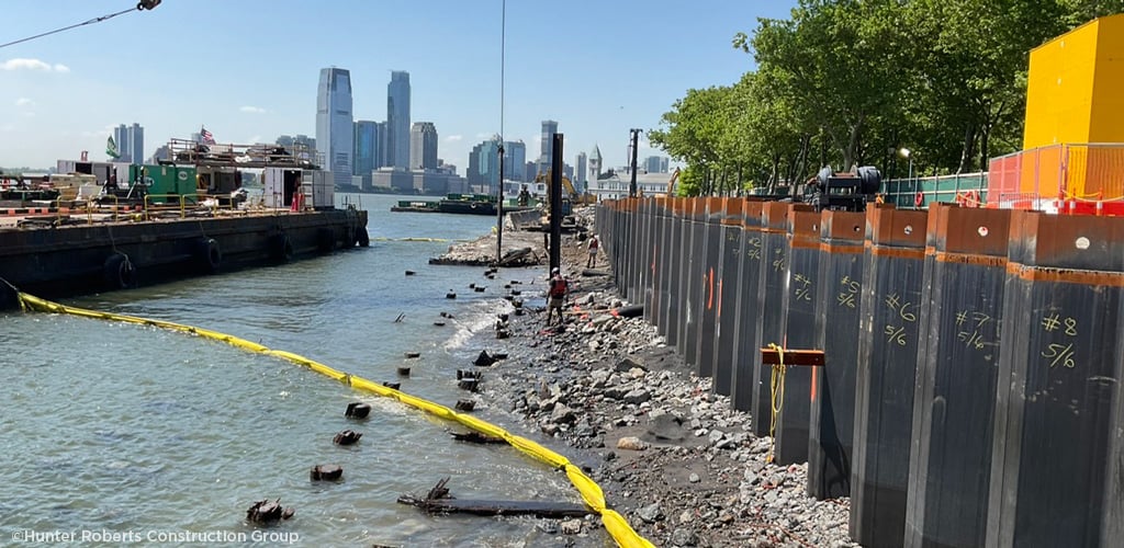 Pilings along an urban shoreline.