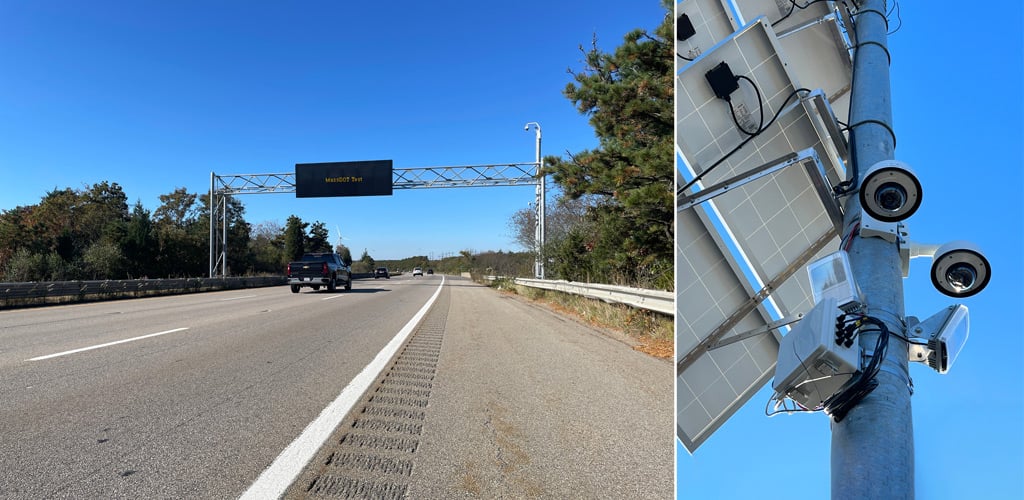Highway dynamic message sign displaying traveler information above a multi-lane roadway.