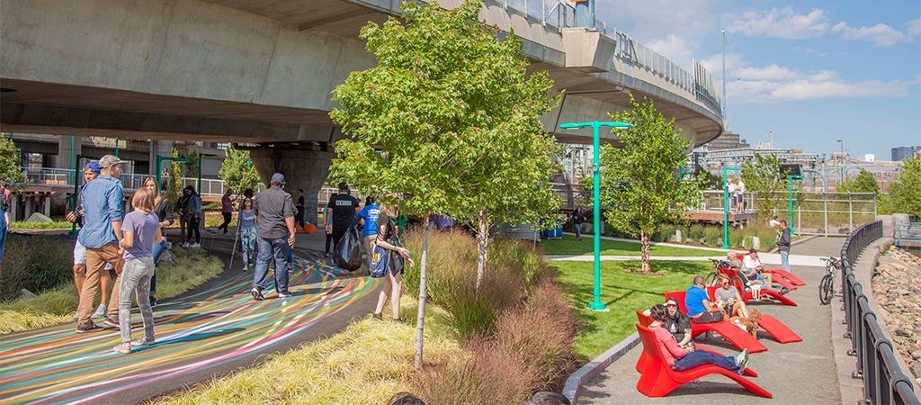 Urban space in Boston is transformed into a community asset, including walkways and seating areas.